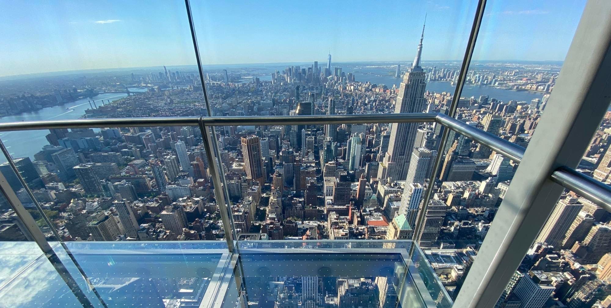 New York City Skyline seen through a glass elevator