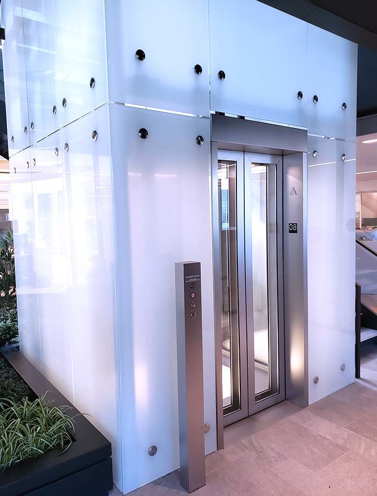 Smoked Glass external Elevator Shaft-way